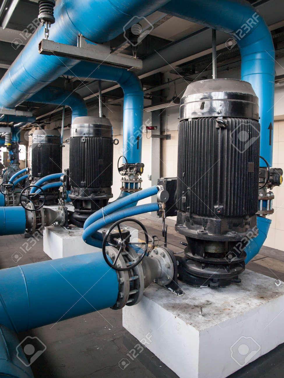 37697799-water-pump-with-large-electric-motors-built-into-an-industrial-installation